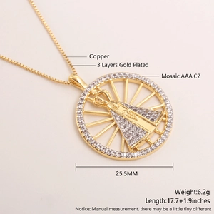 Detailed close-up of 18k gold plated Virgin Mary pendant with AAA zircon stones