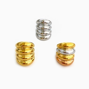 Three-piece metallic croissant ring set in silver, gold, and tricolor finishes