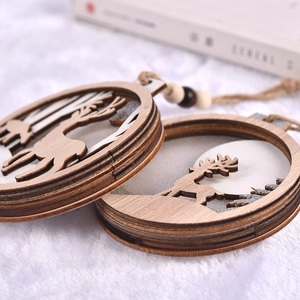 Lighted wooden reindeer Christmas ornaments with laser-cut pine forest scene on white fur