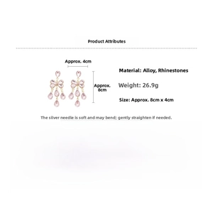 Détails sur la taille et le poids des boucles d'oreilles nœud rose avec cristaux