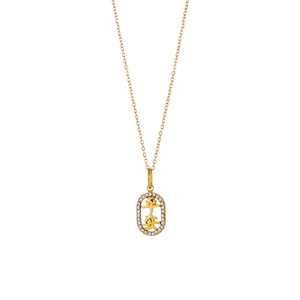 Macro shot of gold pendant with white zircon halo and Ping An Chinese character