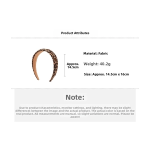 Detailed view of leopard print fabric hair claw clip with size and weight specifications