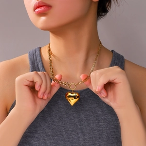 18K gold plated stainless steel layered necklace with asymmetric heart pendant on model