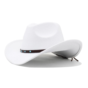 Detailed view of white felt cowboy hat with turquoise studs and brown leather band