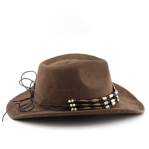 Detail view of brown suede cowboy hat featuring decorative beads and leather drawstring