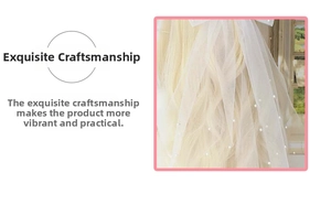Detail of white bridal veil mesh with pearls elegantly displayed on long blonde hair