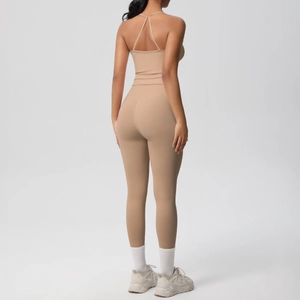Detail view of the back design on the khaki cross-back sports bra and yoga leggings set