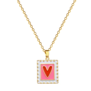 Gold tone square postage stamp necklace with pink enamel and red heart pendant