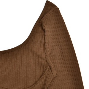 Close-up of ribbed texture and neat stitching on the brown backless bodysuit neckline