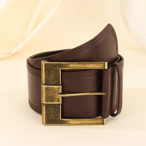 Close-up of vintage brown leather belt with antique bronze square buckle and stitching