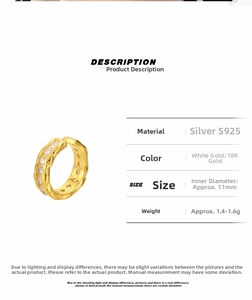 Detailed macro view of S925 sterling silver ear cuff with gold plating and zircon inlay