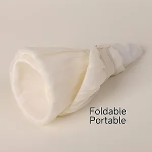 Elegant off-white foldable sun hat for women with pleated texture and packable design