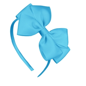 Detail view of sky blue grosgrain ribbon texture on handmade girls bow headband
