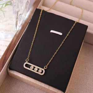 Gold titanium steel geometric necklace with moving zircon stones in rectangle pendant