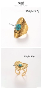 Detailed view of bohemian gold rings featuring turquoise inlay and embossed patterns