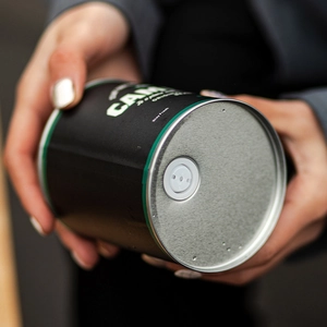 Black airtight coffee tin with one-way exhaust valve for fresh bean storage