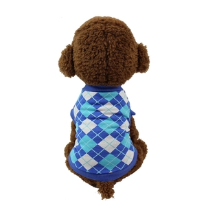 Macro detail of blue and white argyle knit pet vest for small dogs on a plush model