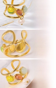 Detail of 18K gold plated ring with natural pearl and colorful gemstone inlay