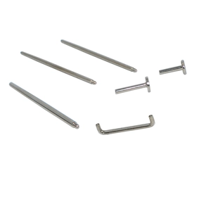 Detailed view of 316L stainless steel body piercing needles in various shapes and sizes