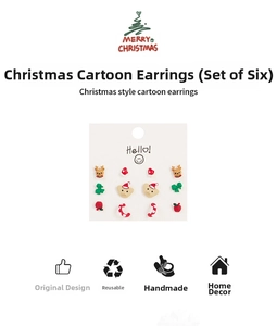 Close-up of 6-pair Christmas stud earrings set including reindeer and bear designs