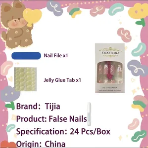 Press-on nail kit with 24 pink floral daisy pieces, ribbon bow designs, and glue accessories