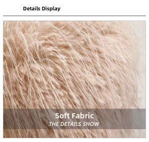 Macro detail of soft cream-colored plush faux fur texture on this stylish handbag