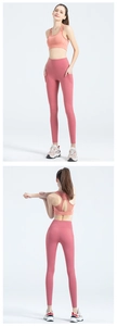 Close-up of high-waist yoga leggings with side pockets and a racerback sports bra