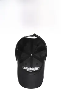 Detail view of cotton baseball cap interior with breathable eyelets and sweatband