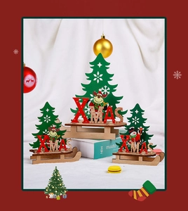 Three-piece wooden Christmas sled decor set with XMAS letters on faux snow background