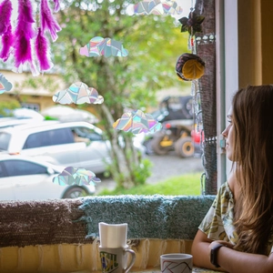 Rainbow prism cloud window stickers creating colorful sun catchers on glass surface