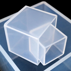 Macro view of flexible translucent cube silicone molds for DIY resin casting