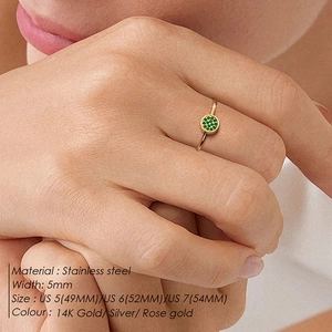 Detail of 5mm stainless steel ring with green stone inlay and size chart specifications
