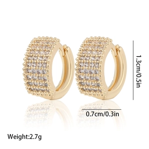 Detail of 14K gold plated huggie earrings with cubic zirconia and size dimensions