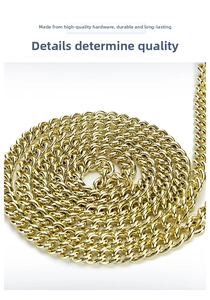 Detail shot of the gold-plated metal chain strap with polished texture and craftsmanship