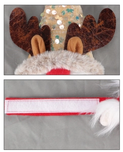 Detail of Christmas reindeer antler curtain buckle with sequins and plush white trim