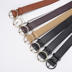 Women's chic PU leather belts with round metal buckles in seven assorted colors on white background