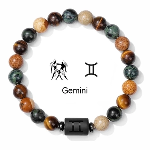 Detailed view of Gemini beaded bracelet with natural tiger eye stone and zodiac symbol