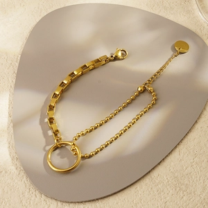 Golden stainless steel dual-link bracelet with square chain and round beads joined by a ring