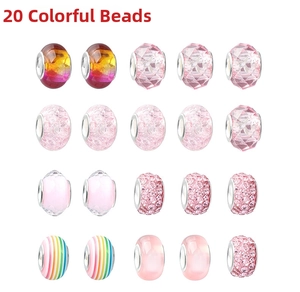 Detail view of 20 assorted blue ocean style beads with glass and crystal patterns