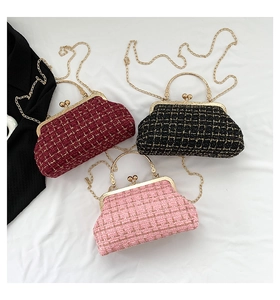Three plaid shell bags in red, black, and pink with gold chain straps and tweed texture