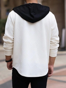 Back view of men hooded jacket featuring white geometric texture and black contrast hood