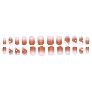 24 faux ongles courts carrés dégradés orange et blanc avec motifs de cœur