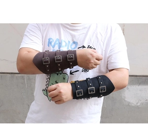 Detail view of adjustable faux leather arm guards with metal buckles and rivets