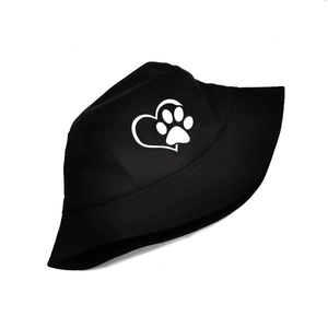 Black bucket hat with white heart-paw print design, stylish sun protection outdoor headwear