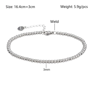 Macro view of 3mm stainless steel bead bracelet showing size details and identity tag