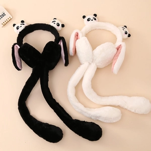 Detail view of plush panda earmuffs featuring moving air sacs and soft faux fur texture
