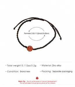 Detail of hand-woven sports bracelet with adjustable strap and basketball charm pendant