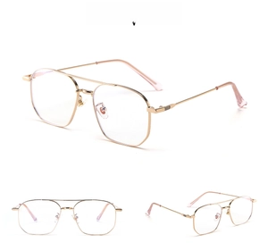 Detailed close-up of model 63058 gold double-bridge metal frames with clear lenses
