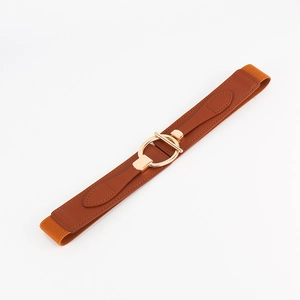 Detailed close-up of brown elastic waist belt with interlocking gold round metal buckle