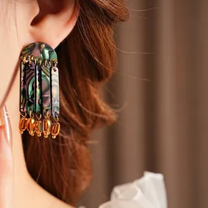 Bohemian tassel drop earrings with iridescent shell texture and gold beads for women